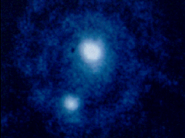 Pluton et charon pris par  le télescope spatial Hubble.

         Produced by: NASA Copyright: Public Domain

         (Courtoisie de la NASA) 